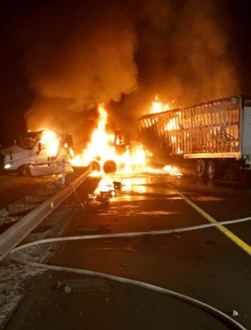 Two semis collided and caught fire Friday morning.